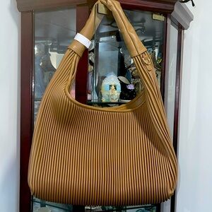 Brand new with tag slouch style bag!